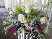 Reception hall decorative flowers. Anthuriums and roses.
