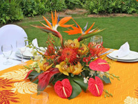 Maui tropical flowers at Sheraton Maui. Tropical arrangement in bright oranges and reds.