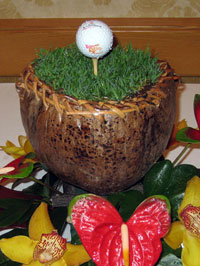 Centerpiece with real grass and golf ball for Maui golf convention